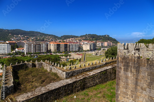 Baiona, Spain. View of medieval fortifications and cities