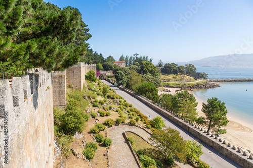 Baiona, Spain. Fortification of the fortress of Monterreal on the shore of the bay. The fortress is included in the list of the most picturesque historical buildings of UNESCO