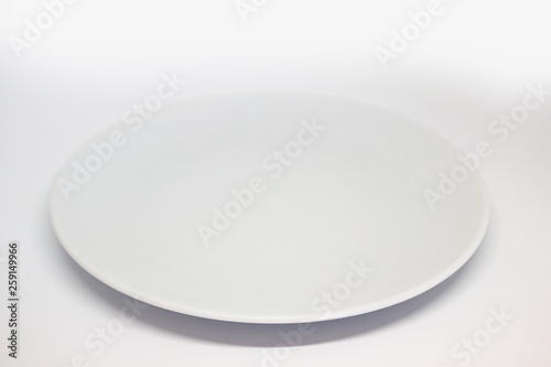 Empty plate on white background