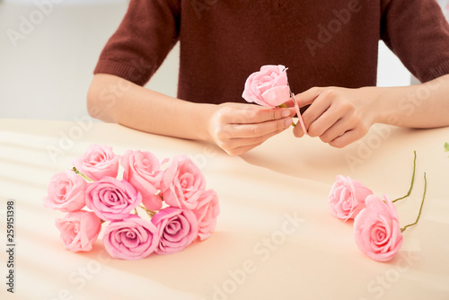 People making paper craft flower art