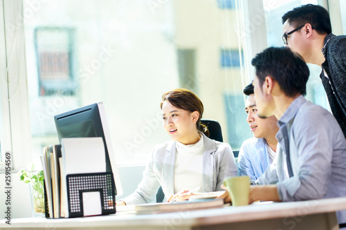 young asian business people meeting in office