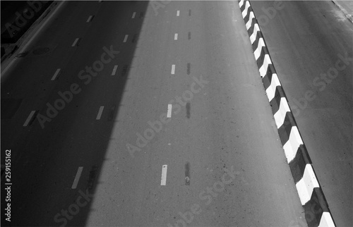 asphalt road texture with white dashed line