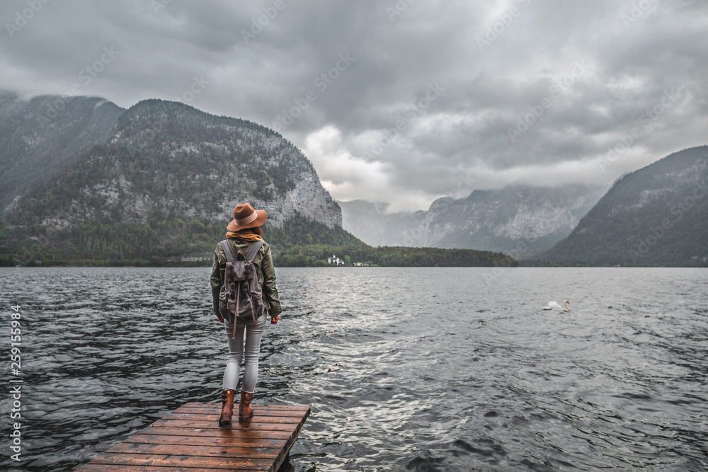Young woman with a backpack outdoors