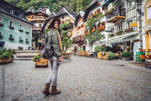 Beautiful girl in an alpine village © AboutLife