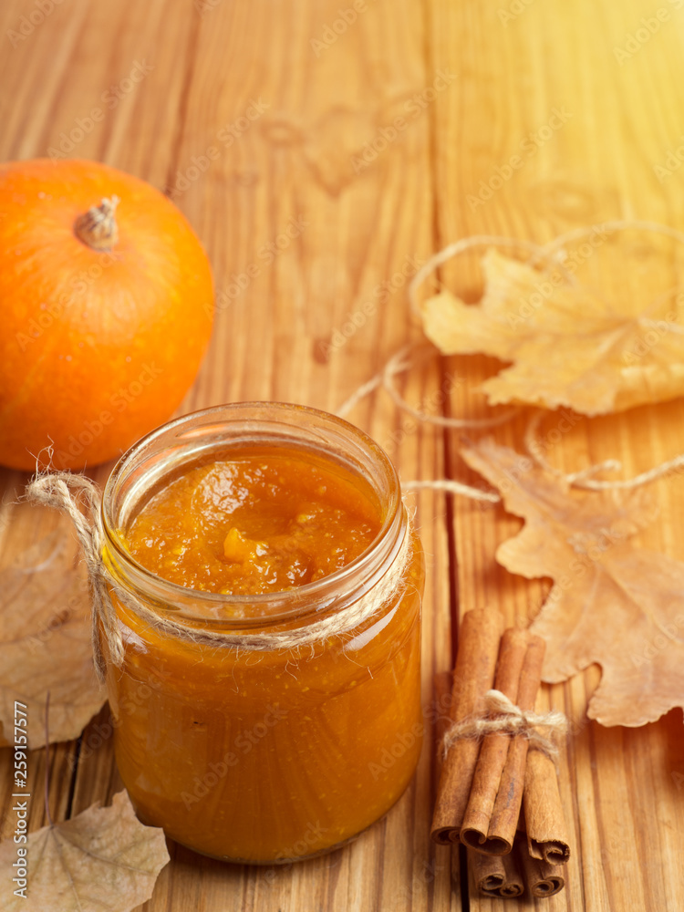 Homemade Pumpkin puree/jam on wooden background Homemade Pumpkin puree/jam on wooden background