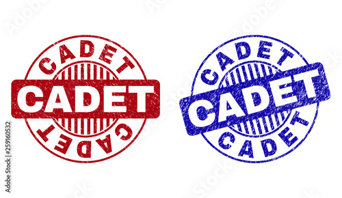 Grunge CADET round stamp seals isolated on a white background. Round seals with distress texture in red and blue colors. Vector rubber imitation of CADET title inside circle form with stripes.