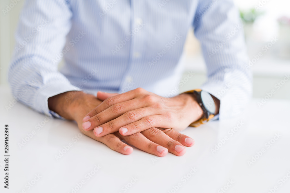 Close up of man hands over white table