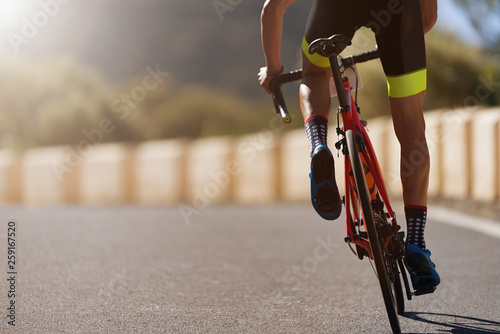 Fototapeta Naklejka Na Ścianę i Meble -  Road bike cyclist man cycling,athlete on a race cycle