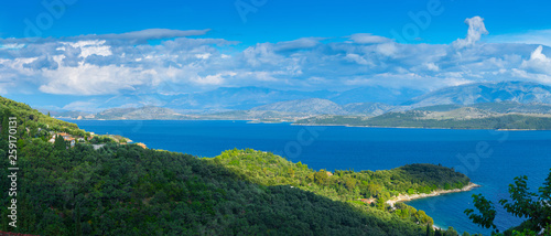 Beautiful summer panoramic seascape.  Green slopes in close bays with crystal clear azure water. Coastline of north part Corfu island, Ionian archipelago, Greece. © Sodel Vladyslav