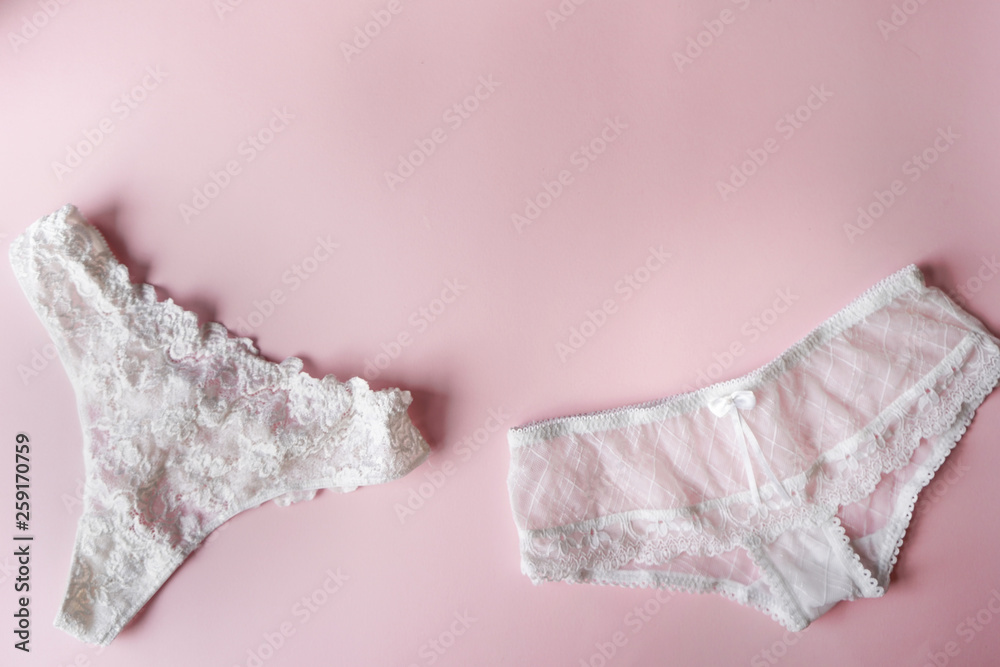 Fotografia do Stock: Pretty young girl in pink panties over white