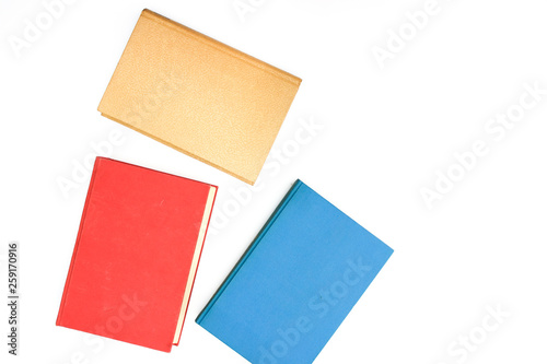 Colorful books on white backgroundnotebook, pencil, brush, , working, business, office, isolated, desk, white, monitor, screen, desktop, table, work, communication, equipment, blank, black, phone, nob photo