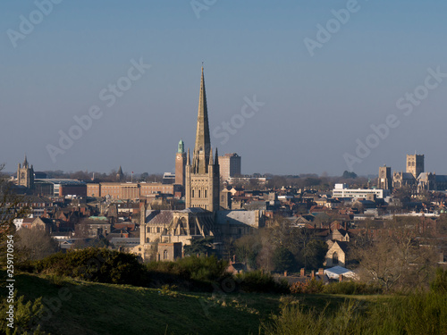 Norwich Cathedral spire stands tall above city, Norfolk, England, UK