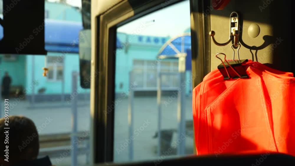 Looking out the window of intercity bus departing from bus station ...