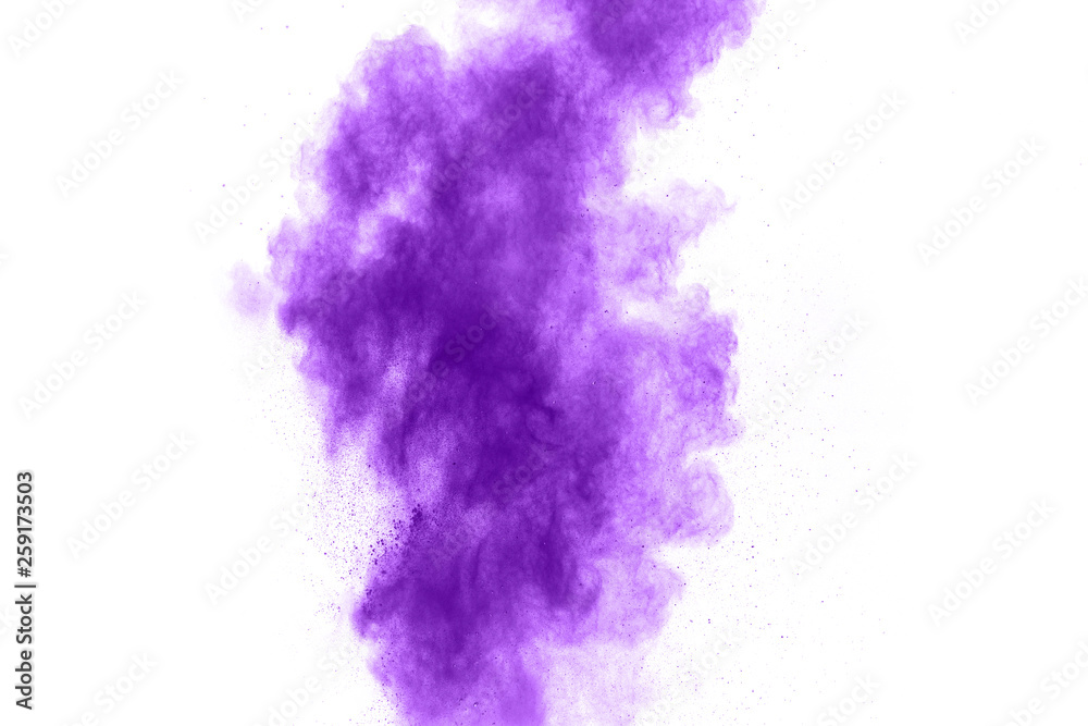 Purple color powder explosion cloud  on white background.Closeup of purple dust particles splash on background.