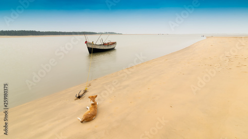 Boat and river at Tajpur, West Bengal, India photo