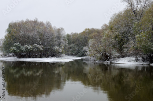 Snow-covered river banks