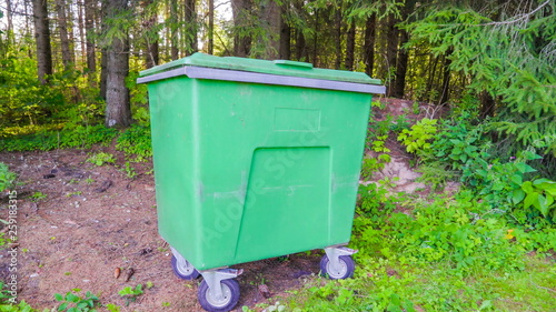 12172_The_big_green_trashbin_with_the_trees_on_the_back_in_Ireland.jpg