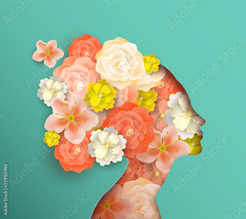 Papercut woman head with spring flowers