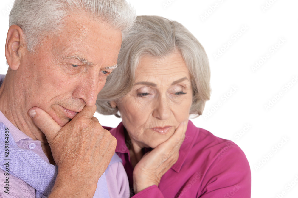 Portrait of sad senior couple on white background Portrait of sad senior couple on white background
