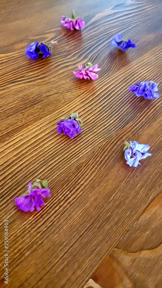 Small blue flowers on wooden table vertical view Small blue flowers on wooden table vertical view