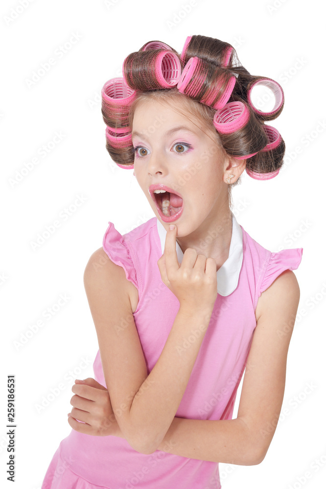 Portrait of emotional little pretty girl with hair curlers Portrait of emotional little pretty girl with hair curlers
