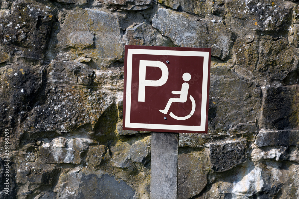A sign indicating a disabled friendly car park A sign indicating a disabled friendly car park