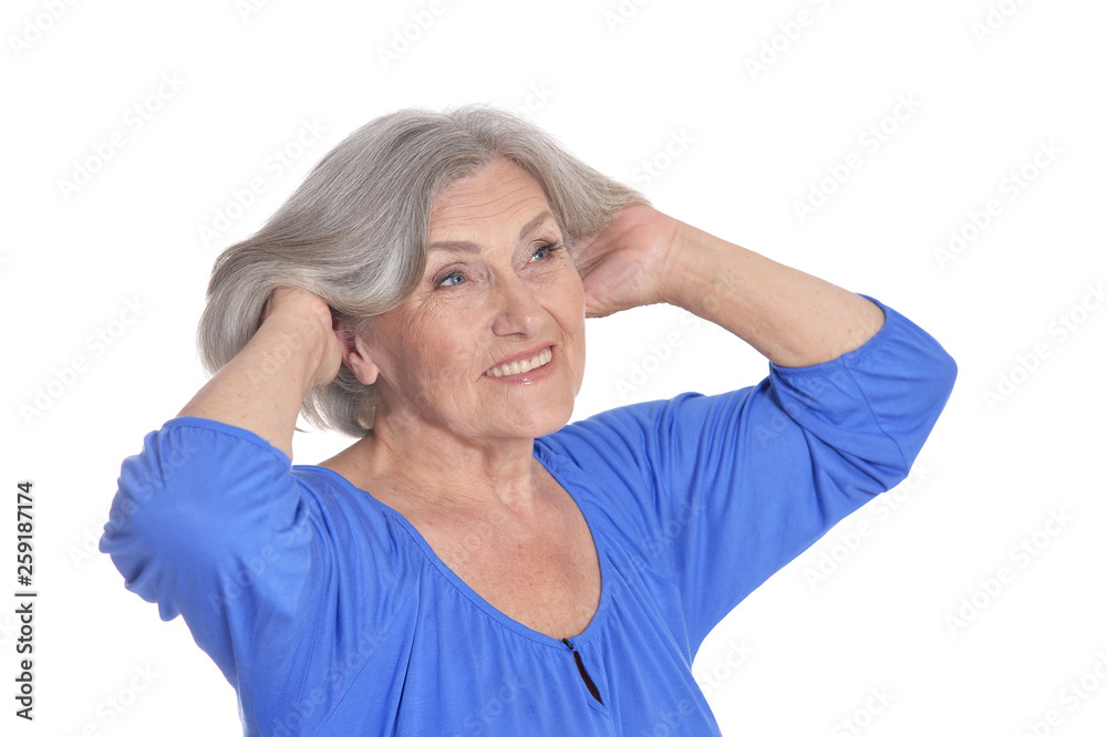 Portrait of beautiful senior woman posing on white background Portrait of beautiful senior woman posing on white background