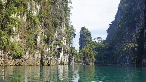 tropical landscape on chiao lan lake in khao sok photo