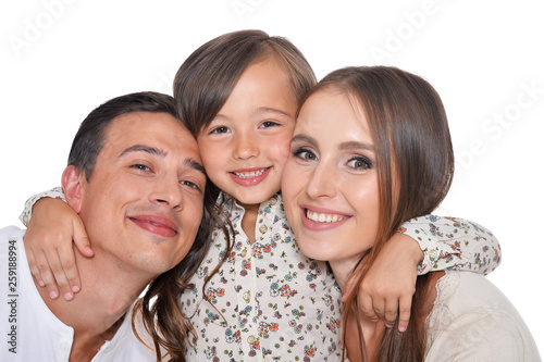 Happy family of three smiling and hugging on white background