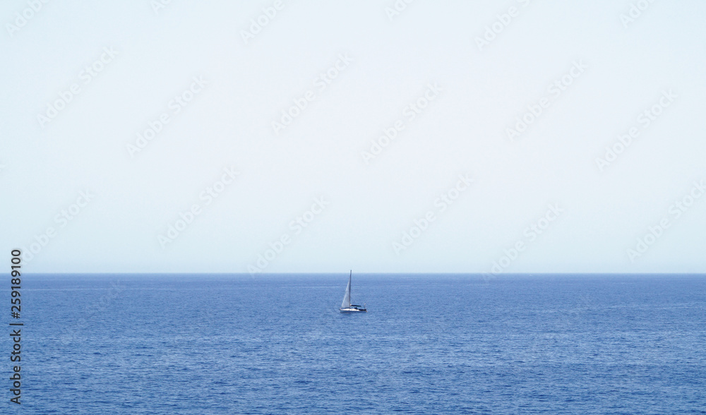 Lonely sailboat on the sea