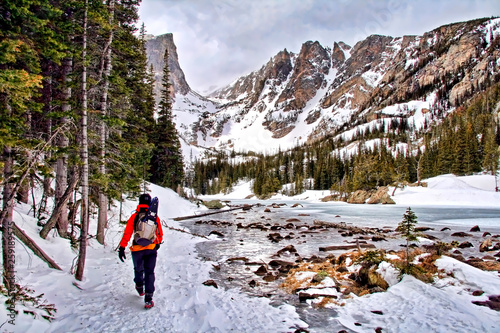 Winter hiker in a snowy Rocky Mountain National Park, Colorado