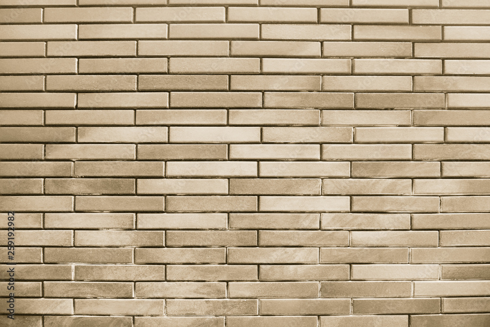Obraz premium Old beige brick wall background texture