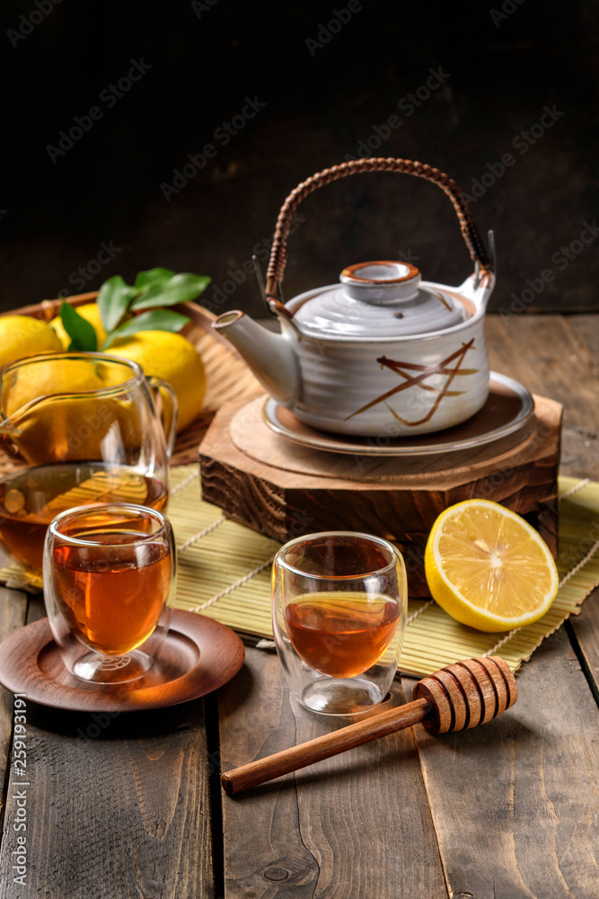 Hot tea with lemon and natural honey,