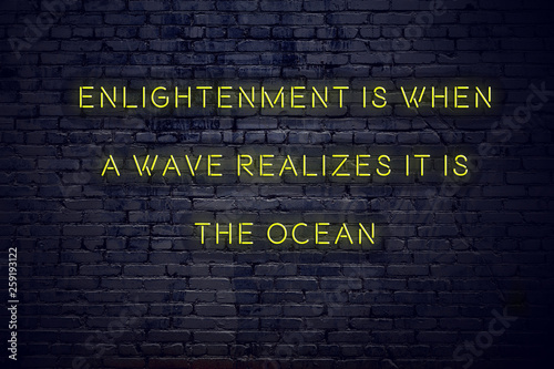 Bilde på lerret Positive inspiring quote on neon sign against brick wall enlightenment is when a
