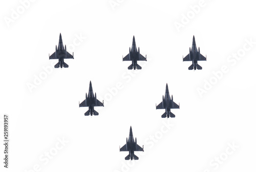 Squadron of military planes compound of six modern fighter jets against white sky. Concept of war, air defense and attack.  
