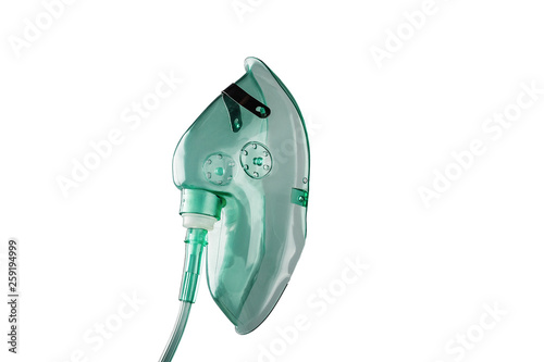 Medical oxygen mask isolated over a white background . photo