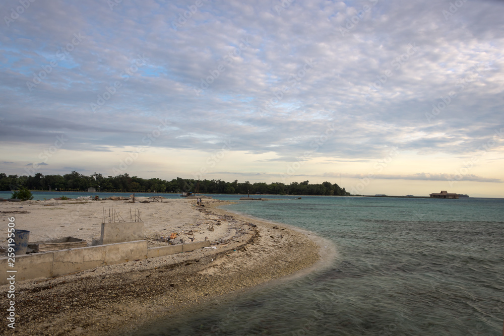 A construction of the beach on Royal Island Resort, Indonesia taken with evening skies.