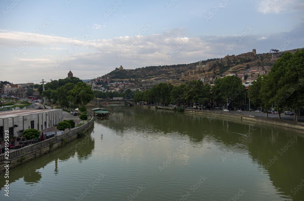 View from the Bridge of Peace in Tbilisi, a pedestrian bridge over the Mtkvari River in Tbilisi, Georgia