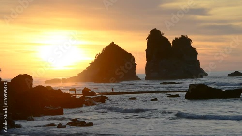 Colourful beautiful sunset over the Tasman Sea coast, New Zealand