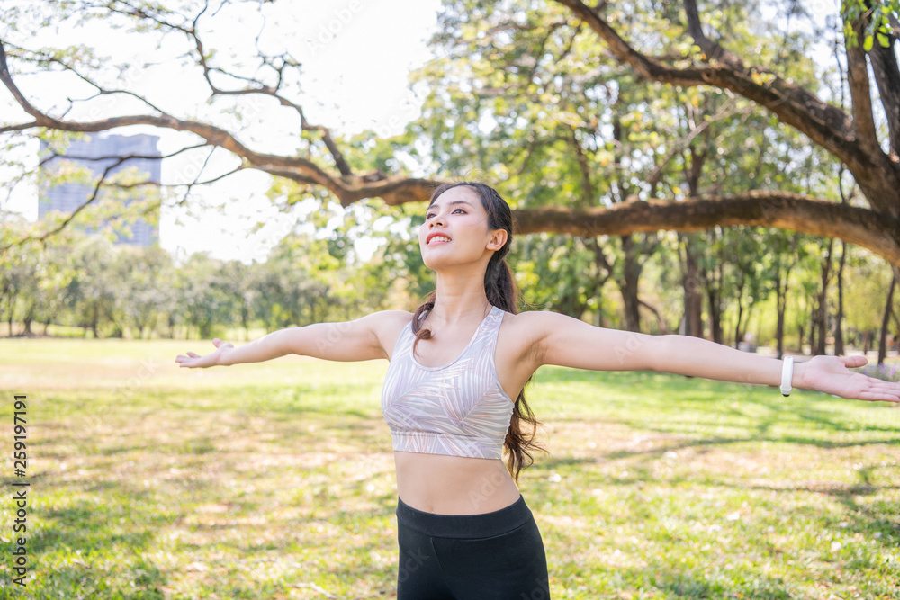 Concept of exercise. Beautiful girl stretching the muscles before running. Women exercising in the garden with freshness. Concept of exercise. Beautiful girl stretching the muscles before running. Women exercising in the garden with freshness.
