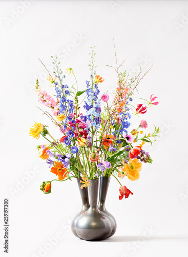 Flowers in vase against white background