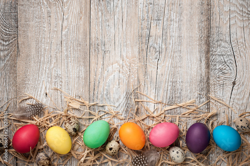 Easter eggs on wooden background