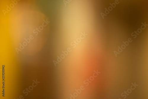 Abstract multicolored blurred background with warm hues