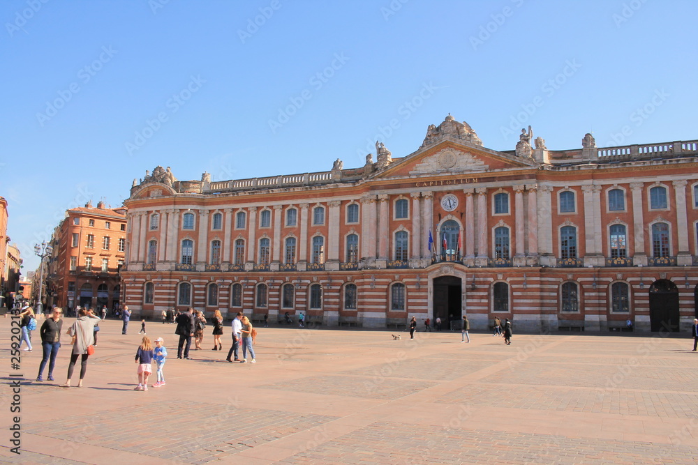 Toulouse central square and the emblematic and majestic Capitole, a town hall and theatre in the heart of the pink city, the  major city of Southwestern France and historical capital of Languedoc