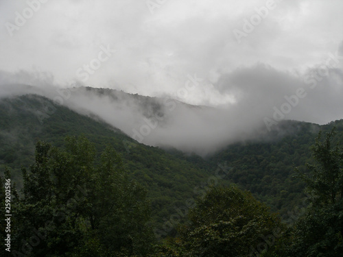 Clouds on the tops of the mountains. Abkhazia