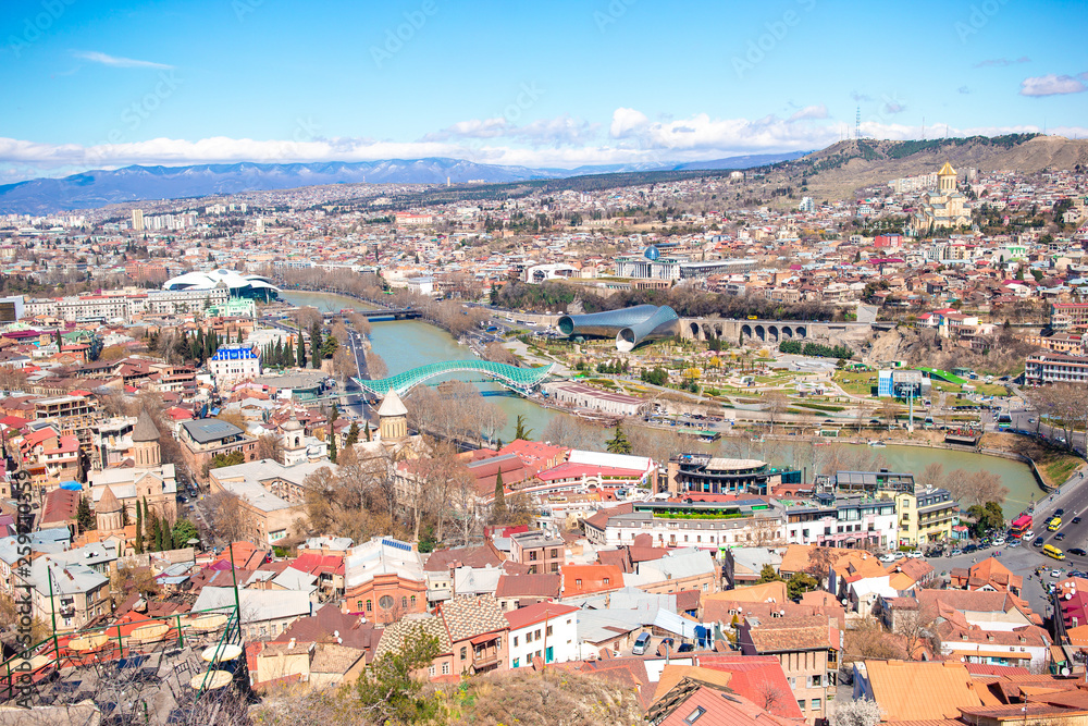 Tbilisi city panorama. Old city, new Summer Rike park, river Kura, the European Square and the Bridge of Peace