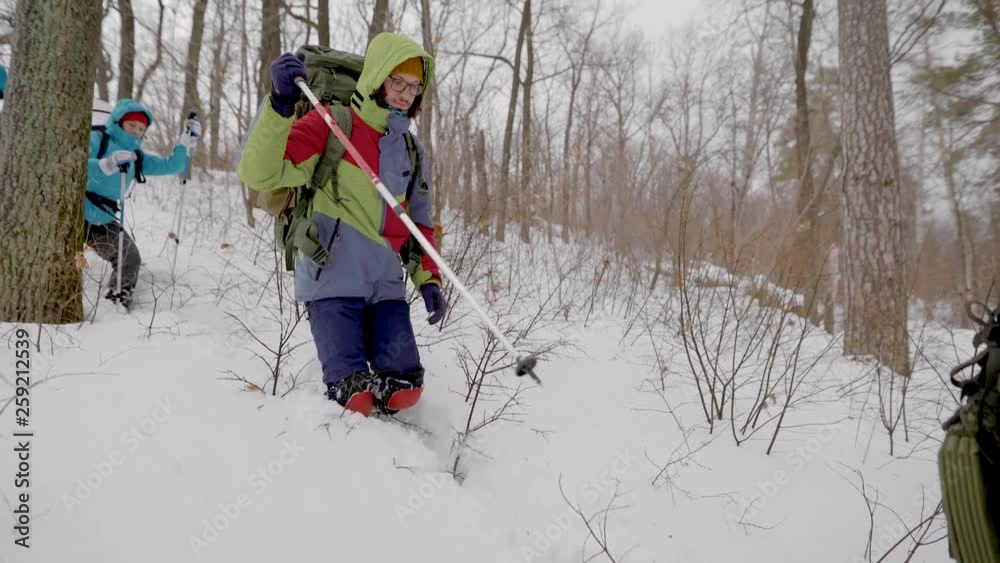 Four people in the expedition. The hike takes place in difficult conditions, people fall into snowdrifts. Four people in the expedition. The hike takes place in difficult conditions, people fall into snowdrifts.