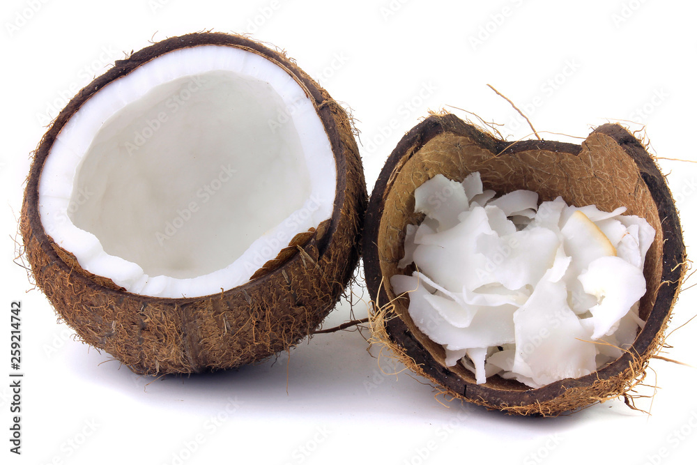 fresh coconut flakes and chips placed in bark isolated on white background fresh coconut flakes and chips placed in bark isolated on white background