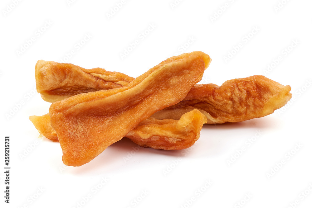 Tasty dried papaya strips, sweet fruit slices, close-up, isolated on white background Tasty dried papaya strips, sweet fruit slices, close-up, isolated on white background