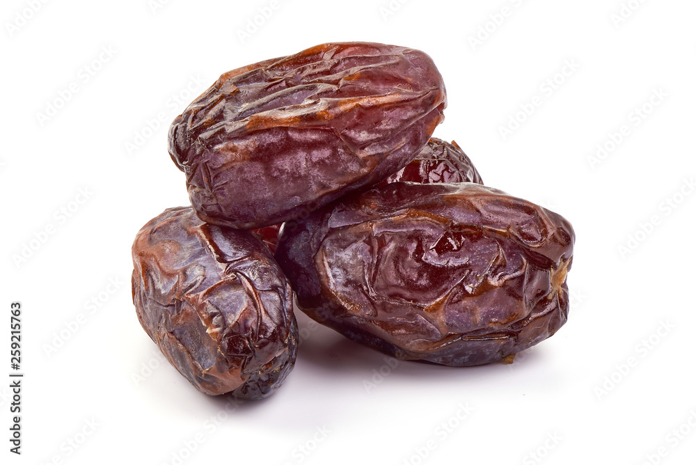 Fresh Medjool dry Dates, close-up, isolated on white background Fresh Medjool dry Dates, close-up, isolated on white background